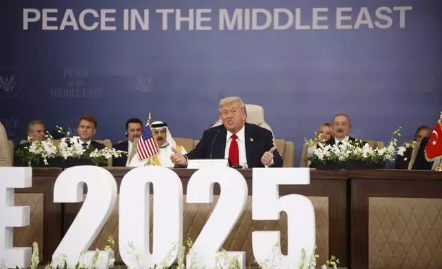 President Donald Trump attends the signature ceremony at the Gaza International Peace Summit, in Sharm el-Sheikh, Egypt, Monday, Oct.13 2025. (Yoan Valat, Pool photo via AP)