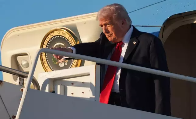 President Donald Trump arrives on Air Force One at Sharm El Sheikh International Airport, Monday, Oct. 13, 2025, in Sharm El Sheikh, Egypt. (AP Photo/Evan Vucci)
