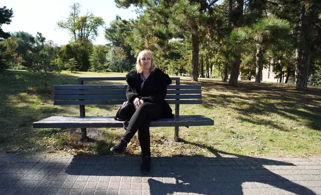 Diana Hrka, the mother of Stefan Hrka, a young man who died when the canopy of the railway station in Novi Sad fell reacts during an interview with The Associated Press, in Belgrade, Serbia, Tuesday, Oct. 14, 2025. (AP Photo/Darko Vojinovic)