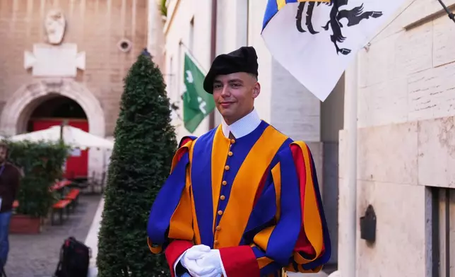 Dario, a new Swiss Guard poses for photos in the Swiss Guard Barracks at the Vatican, Thursday, Oct. 2, 2025. (AP Photo/Alessandra Tarantino)