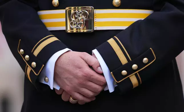 Captain Lorenz Keusch poses for reporters during the presentation of the Swiss Guard Mezza-Gala uniform in the Swiss Guard Barracks at the Vatican, Thursday, Oct. 2, 2025. (AP Photo/Alessandra Tarantino)