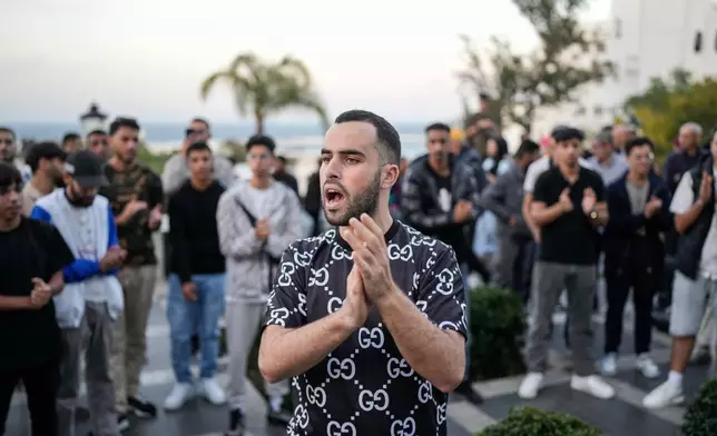 People take part in a youth led protest calling for education and healthcare reforms, in Tangier, Morocco, Saturday, Oct. 18, 2025. (AP Photo/Mosa'ab Elshamy)