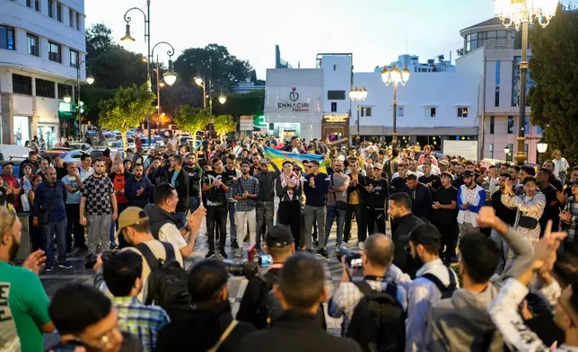 People take part in a youth led protest calling for education and healthcare reforms, in Tangier, Morocco, Saturday, Oct. 18, 2025. (AP Photo/Mosa'ab Elshamy)