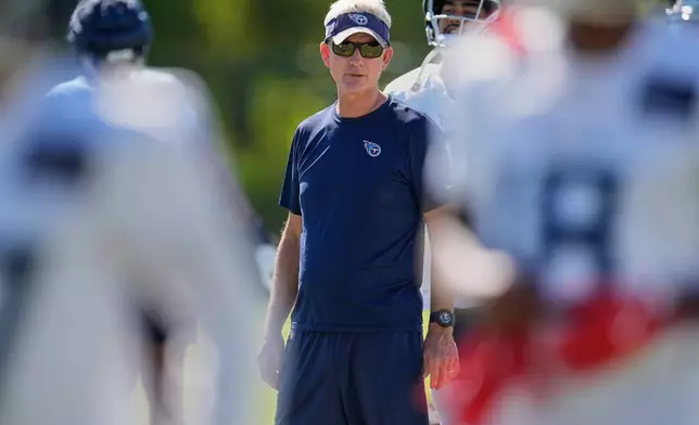 Tennessee Titans interim head coach Mike McCoy watches his players during practice at the team's NFL football training facility Wednesday, Oct. 15, 2025, in Nashville, Tenn. (AP Photo/George Walker IV)