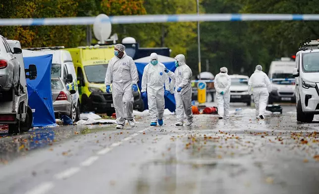 The police investigation continues at the scene near Heaton Park Hebrew Congregation synagogue in Manchester, England, Friday, Oct. 3, 2025, where two people died in a terror attack on Thursday. (Peter Byrne/PA via AP)