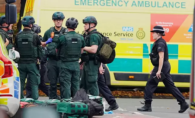 Emergency services at the scene of a stabbing incident at Heaton Park Hebrew Congregation synagogue, in Crumpsall, Manchester, England, Thursday Oct. 2, 2025. (Peter Byrne/PA via AP)