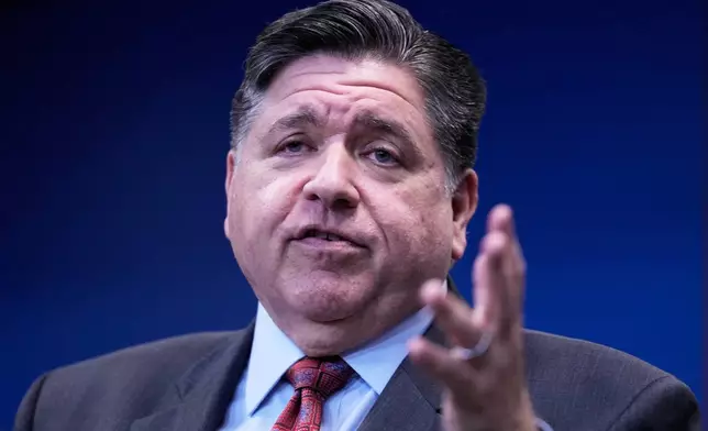 Governor JB Pritzker talks to media at a news conference in Chicago, Monday, Oct. 6, 2025. (AP Photo/Nam Y. Huh)