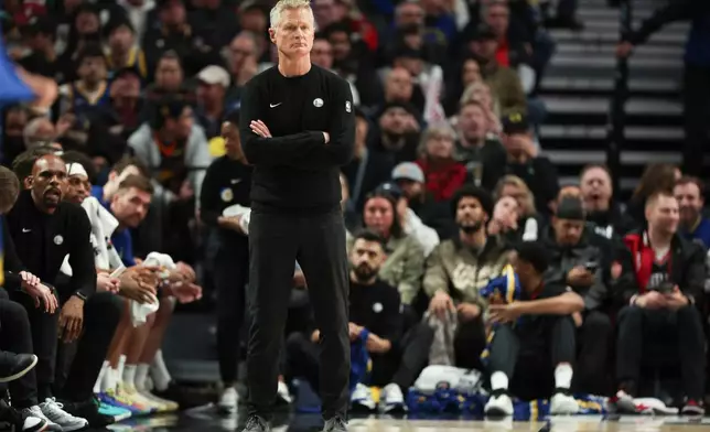 Golden State Warriors Head Coach Steve Kerr looks on during the second half of an NBA basketball game against the Golden State Warriors Friday, Oct. 24, 2025, in Portland, Ore. (AP Photo/Amanda Loman)