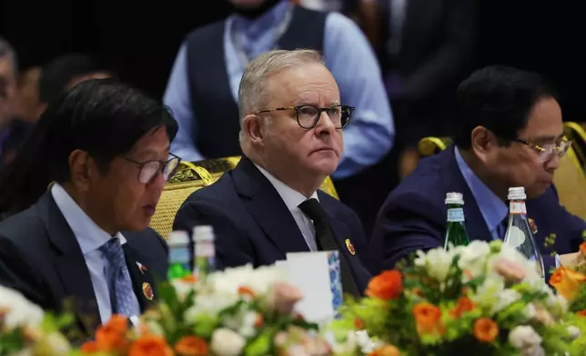 Philippine President Ferdinand Marcos Jr., from left, Australia's Prime Minister Anthony Albanese, and Vietnam's Prime Minister Pham Minh Chính watch a performance at the reception for East Timor's admission to ASEAN on the sidelines of the Association of Southeast Asian Nations (ASEAN) summit at the Kuala Lumpur Convention Centre in Kuala Lumpur, Malaysia, Monday, Oct. 27, 2025. (How Hwee Young/Pool Photo via AP)