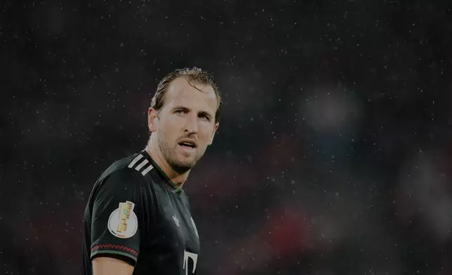 Bayern's Harry Kane reacts during the German soccer cup match between Cologne and FC Bayern Munich in Cologne, Wednesday, Oct. 29, 2025. (AP Photo/Martin Meissner)