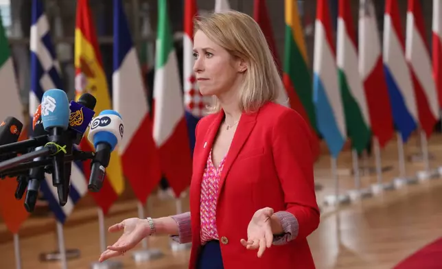 European Union foreign policy chief Kaja Kallas speaks with the media as she arrives for an EU Summit at the European Council building in Brussels, Thursday, Oct. 23, 2025. (AP Photo/Francois Walschaerts)