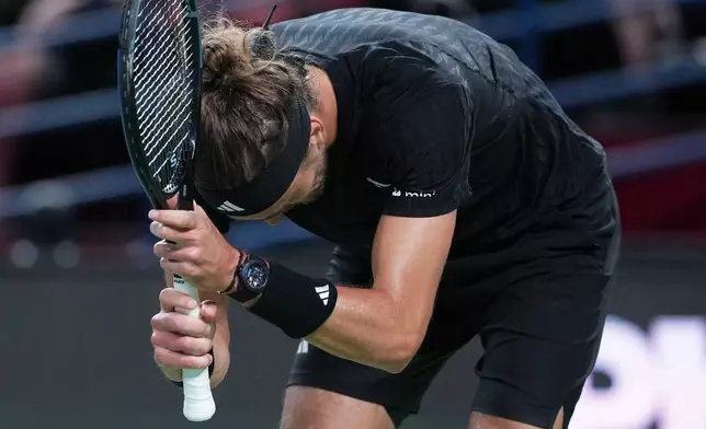 Alexander Zverev of Germany reacts after losing a point to Arthur Rinderknech of France during the men's singles match of the Shanghai Masters tennis tournament at Qizhong Forest Sports City Tennis Center, in Shanghai, China, Monday, October. 6, 2025. (AP Photo/Andy Wong)
