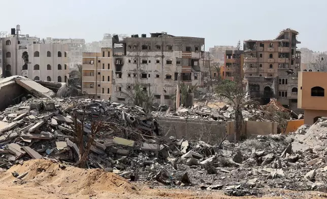 This picture taken during a media tour organised by the Israeli army shows war-damaged and destroyed buildings in the vicinity of the Jordanian Field Hospital in Gaza City, Friday, Oct. 3, 2025. (Jack Guez/Pool Photo via AP)