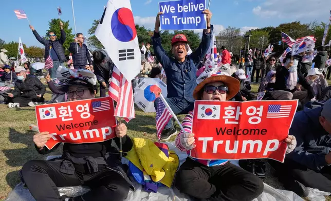Supporters of U.S. President Donald Trump attend a rally to welcome his visit in Gyeongju, South Korea, Wednesday, Oct. 29, 2025. (AP Photo/Ahn Young-joon)