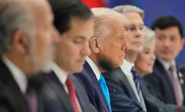 President Donald Trump, with Commerce Secretary Howard Lutnick, Secretary of State Marco Rubio and Treasury Secretary Scott Bessent, holds a talk with South Korean President Lee Jae Myung at the Gyeongju National Museum in Gyeongju, South Korea, Wednesday, Oct. 29, 2025. (AP Photo/Mark Schiefelbein)
