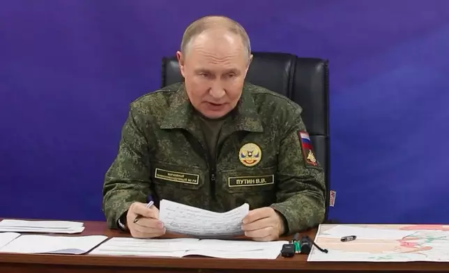 In this image made from video released by the Russian Presidential Press Office on Sunday, Oct. 26, 2025, Russian President Vladimir Putin speaks while visiting one of the command posts of the Joint Group of Forces. (Russian Presidential Press Office via AP)