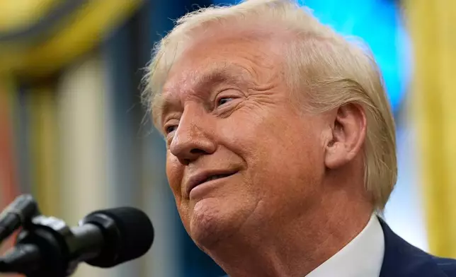 President Donald Trump speaks in the Oval Office of the White House, Friday, Oct. 10, 2025, in Washington. (AP Photo/Alex Brandon)