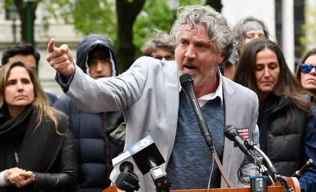 FILE - Del Bigtree speaks against legislation to narrow exemptions to state-mandated vaccines during a rally at the state Capitol Tuesday, May 14, 2019, in Albany, N.Y. (AP Photo/Hans Pennink, File)