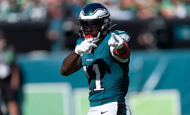 Philadelphia Eagles wide receiver A.J. Brown signals first down during the first half of an NFL football game against the Denver Broncos on Sunday, Oct. 5, 2025, in Philadelphia. (AP Photo/Chris Szagola)