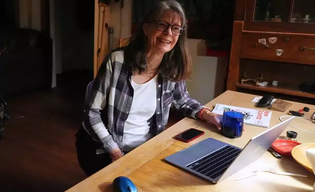 Mary E. Brunkow smiles after hearing about winning a Nobel Prize in medicine for part of her work on peripheral immune tolerance, in Seattle, Monday, Oct. 6, 2025. (AP Photo/Lindsey Wasson)