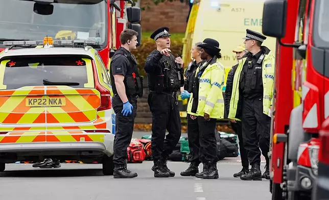 Emergency services at the scene of a stabbing at Heaton Park Hebrew Congregation synagogue, in Crumpsall, Manchester, England, Thursday Oct. 2, 2025. (Peter Byrne/PA via AP)