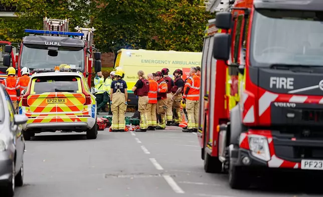 Emergency services at the scene of a stabbing at Heaton Park Hebrew Congregation synagogue, in Crumpsall, Manchester, England, Thursday Oct. 2, 2025. (Peter Byrne/PA via AP)