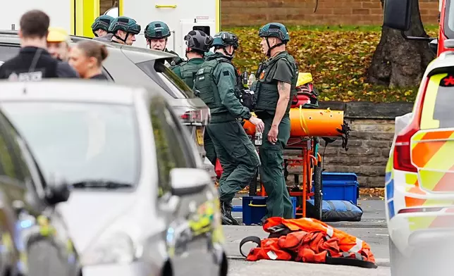 Emergency services at the scene of a stabbing at Heaton Park Hebrew Congregation synagogue, in Crumpsall, Manchester, England, Thursday Oct. 2, 2025. (Peter Byrne/PA via AP)