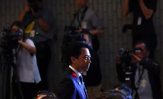 Japan's Agriculture Minister Shinjiro Koizumi reacts after his speech at the Liberal Democratic Party's (LDP) leadership election in Tokyo, Japan, Saturday, Oct. 4, 2025. (Kim Kyung-Hoon/Pool Photo via AP)