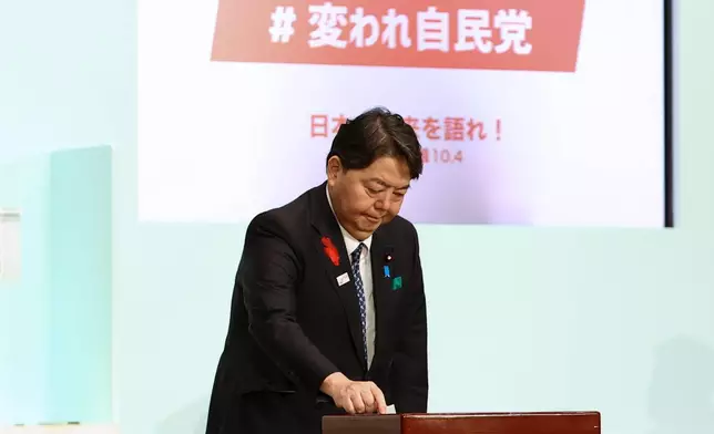 Japan's Chief Cabinet Secretary Yoshimasa Hayashi votes at the Liberal Democratic Party's (LDP) leadership election in Tokyo, Japan, Saturday, Oct. 4, 2025. (Kim Kyung-Hoon/Pool Photo via AP)