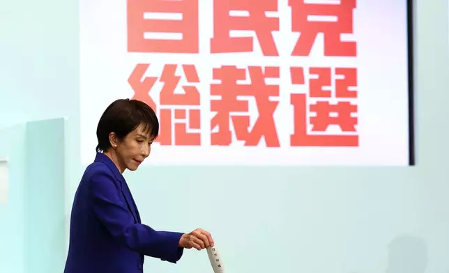 Former Economic Security Minister Sanae Takaichi votes at the Liberal Democratic Party's (LDP) leadership election in Tokyo, Japan, Saturday, Oct. 4, 2025. (Kim Kyung-Hoon/Pool Photo via AP)