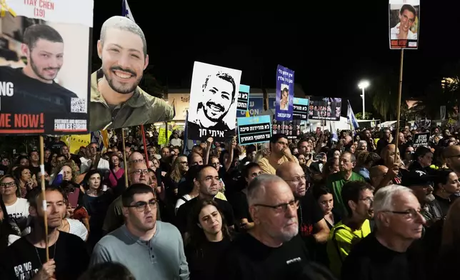 Relatives and supporters of hostages held by Hamas in the Gaza Strip attend a rally calling for their immediate release in Tel Aviv, Israel, Saturday, Oct. 25, 2025. (AP Photo/Mahmoud Illean)