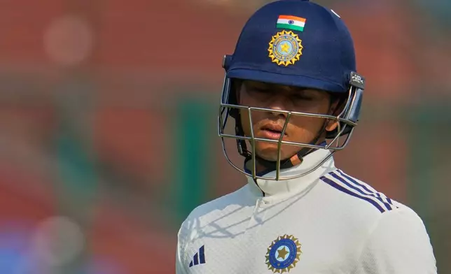 India's Yashasvi Jaiswal walks off the field after losing his wicket on the second day of the second cricket test match between India and West Indies at the Arun Jaitley Stadium in New Delhi, India, Saturday, Oct.11, 2025. (AP Photo/Manish Swarup)