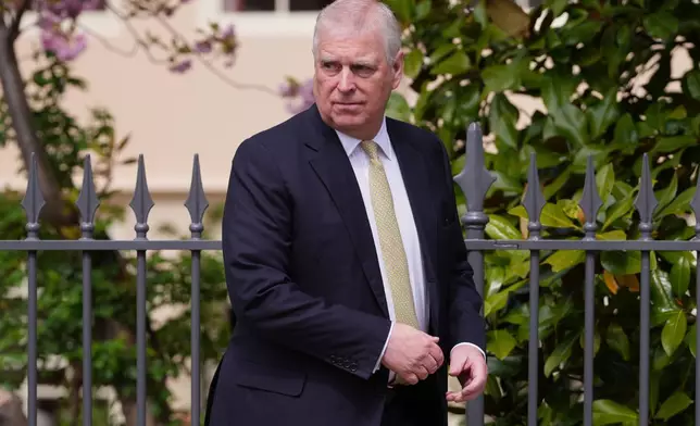 FILE - Prince Andrew looks round as he leaves after attending the Easter Matins Service at St. George's Chapel, Windsor Castle, England, April 20, 2025. (AP Photo/Kirsty Wigglesworth, File)