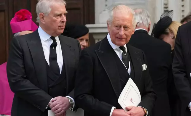 FILE - Britain's Prince Andrew, left, and Britain's King Charles III leave after the Requiem Mass service for the Duchess of Kent at Westminster Cathedral in London, Tuesday, Sept. 16, 2025. (AP Photo/Joanna Chan, File)