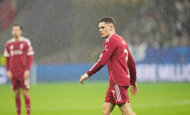 Liverpool's Florian Wirtz walks during the Champions League opening phase soccer match between Eintracht Frankfurt and Liverpool in Frankfurt, Germany, Wednesday, Oct. 22, 2025. (AP Photo/Michael Probst)