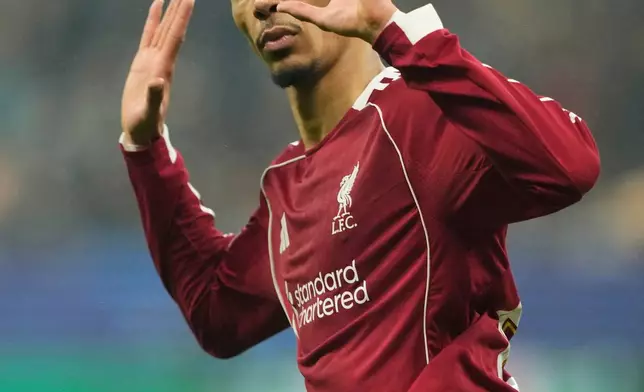Liverpool's Hugo Ekitike celebrates after scoring his side's opening goal during the Champions League opening phase soccer match between Eintracht Frankfurt and Liverpool in Frankfurt, Germany, Wednesday, Oct. 22, 2025. (AP Photo/Michael Probst)