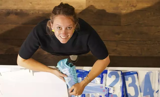 Laura Youngson, CEO of IDA Sports, poses for a photograph at a store in Regent Street, in London, Thursday, Sept. 18, 2025.(AP Photo/Alberto Pezzali)