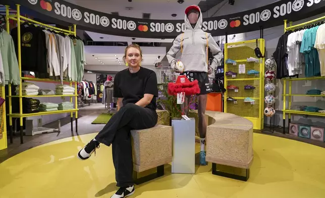 Laura Youngson, CEO of IDA Sports, poses for photographs at a store in Regent Street, in London, Thursday, Sept. 18, 2025. (AP Photo/Alberto Pezzali)