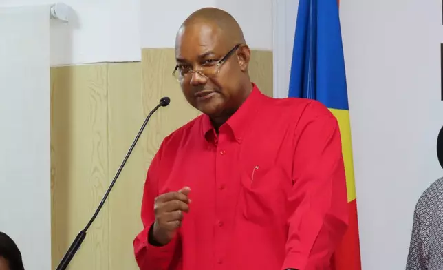President-elect Patrick Herminie gives a speech after winning the runoff presidential election at the Electoral Commission Headquarters in Victoria, Seychelles, Sunday, Oct. 12, 2025. (AP Photo/Emilie Chetty)