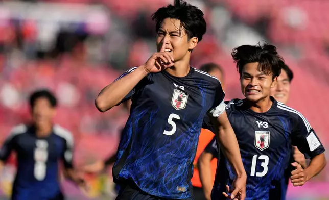 Japan's Rion Ichihara celebrates scoring his side's first goal against Egypt from the penalty spot during a FIFA U-20 World Cup Group A soccer match at National Stadium in Santiago, Chile, Saturday, Sept. 27, 2025. (AP Photo/Esteban Felix)