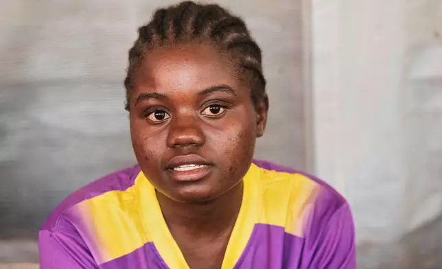 Anita Razo, a 18-year-old girl speaks to the Associated Press, in Shamva, Zimbabwe, Friday, Aug. 29, 2025. (AP Photo/Aaron Ufumeli)