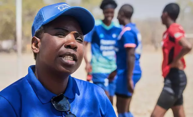 Eneti Tini, a teacher, speaks to the Associated Press, in Shamva, Zimbabwe, Friday, Aug. 29, 2025. (AP Photo/Aaron Ufumeli)