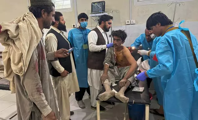 A man, who was injured in the clashes between Pakistan and Afghan forces in border area, receives medical treatment at a hospital in Chaman, a town on the Pakistan side of the border, Wednesday, Oct. 15, 2025. (AP Photo/H. Achakzai)