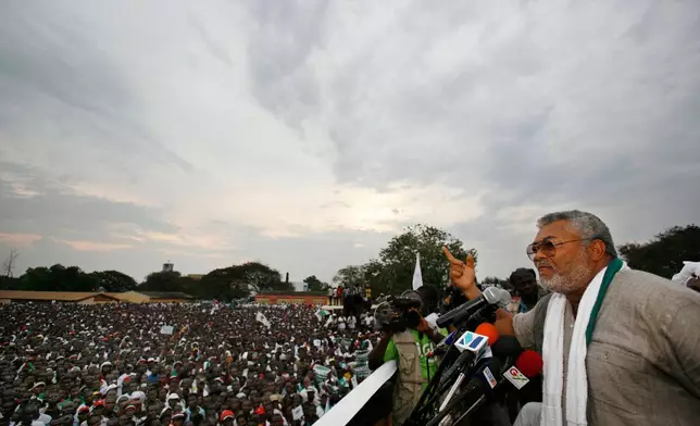FILE - Former Ghanaian President Jerry Rawlings speaks at the final campaign rally for opposition presidential candidate John Atta Mills, in Tema, Ghana., Dec. 5, 2008. (AP Photo/Rebecca Blackwell, File)