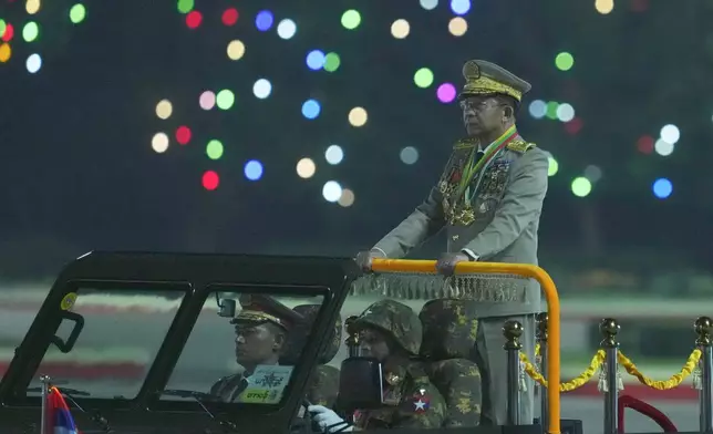 FILE - Senior Gen. Min Aung Hlaing, head of the military council, inspects officers during a parade to commemorate Myanmar's 80th Armed Forces Day in Naypyitaw, Myanmar, March 27, 2025. (AP Photo/Aung Shine Oo, File)