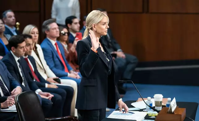 Attorney General Pam Bondi swears in for an oversight hearing before the Senate Judiciary Committee, on Capitol Hill in Washington, Tuesday, Oct. 7, 2025. (AP Photo/Allison Robbert)