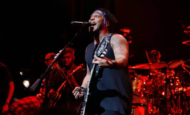FILE - D' Angelo and the Vanguard perform at the Apollo Theatre in New York on Feb. 7, 2015. (Photo by Mark Von Holden/Invision/AP, File)