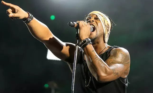 FILE - D'Angelo performs during FYF Fest at L.A. Memorial Sports Arena &amp; Exposition Park in Los Angeles, Aug. 23, 2015. (Photo by Rich Fury/Invision/AP, File)