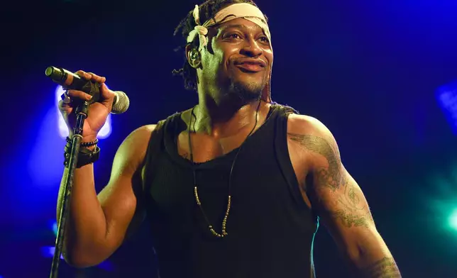 FILE - D'Angelo performs during FYF Fest in Los Angeles on Aug. 23, 2015. (Photo by Rich Fury/Invision/AP, File)