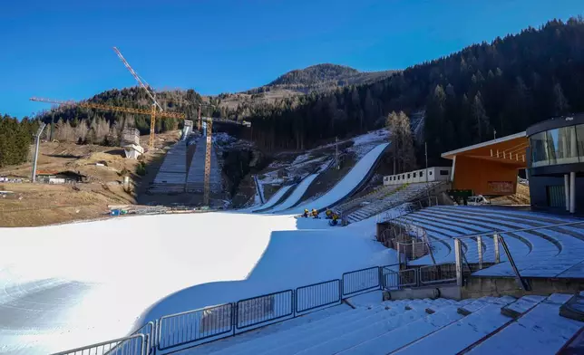 FILE - A view of the Ski Jumping Stadium for the Milan Cortina 2026 Winter Olympics, in Predazzo, Italy, Friday, Jan. 17, 2025. (AP Photo/Luca Bruno, File)